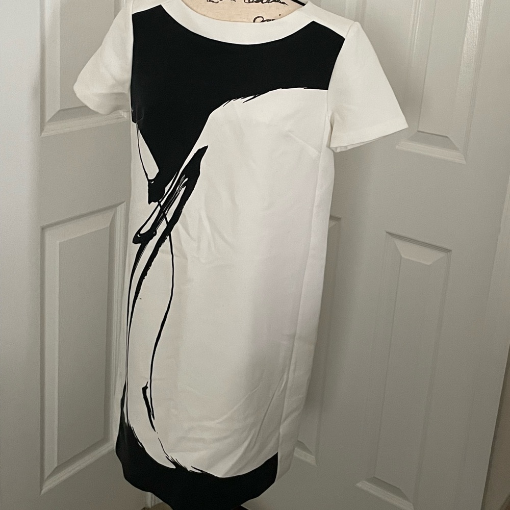 Pretty off white dress.